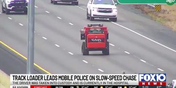 Track loader leads police chase on highway