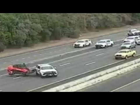 Track loader driver in crazy low speed chase with dozens of police