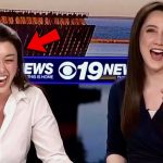 Two news anchors laughing on air.