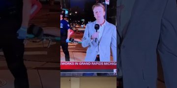 Reporter speaking live on fireworks in Grand Rapids.