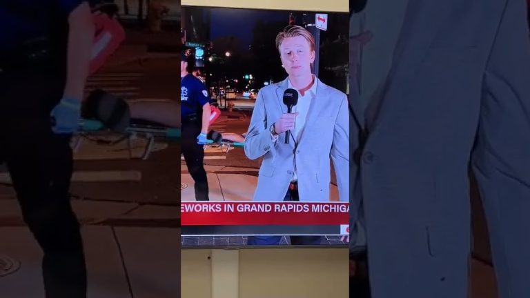 Reporter speaking live on fireworks in Grand Rapids.