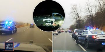 Police chase on highway with multiple vehicles involved.