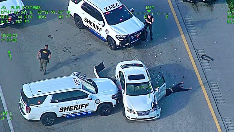 Police vehicles at highway accident scene