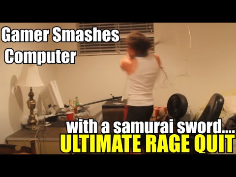 Gamer smashes computer with sword in frustration.