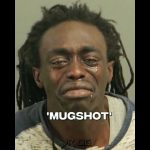 Person crying in a mugshot photo