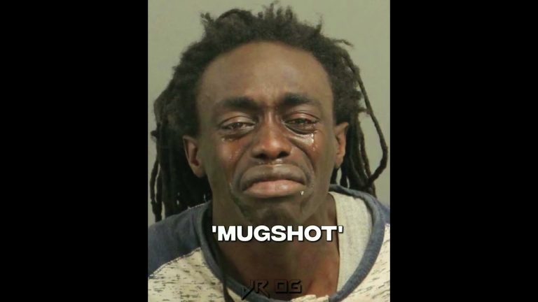 Person crying in a mugshot photo