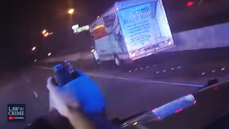 Police chase involving a moving truck at night