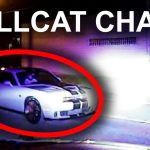 Police chase involving white sports car at night