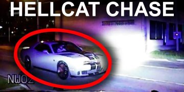 Police chase involving white sports car at night