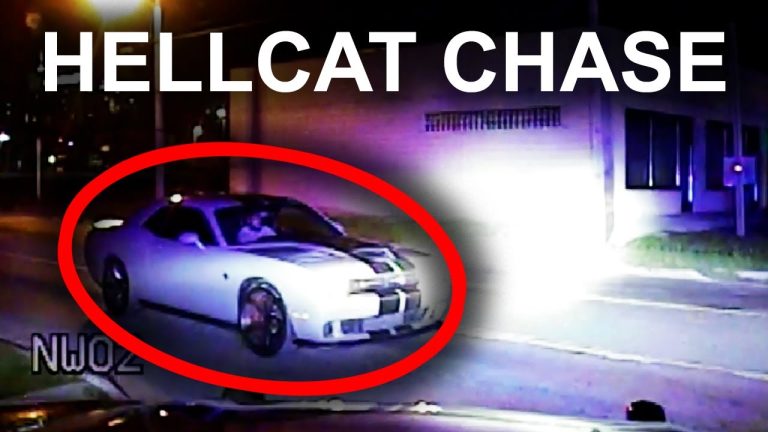 Police chase involving white sports car at night