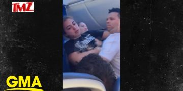 Airplane passenger confrontation caught on video.