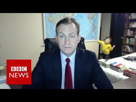 News interview interrupted by child entering room.