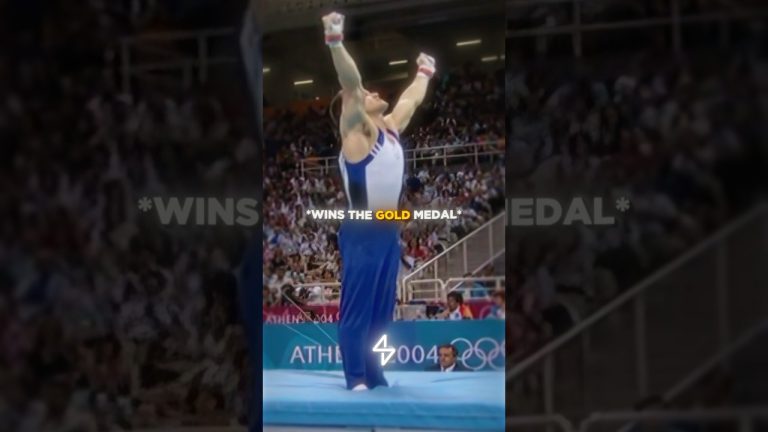 Gymnast celebrates winning Olympic gold medal.