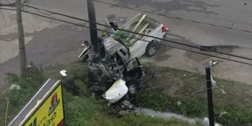 Truck crash into a pole on roadside.