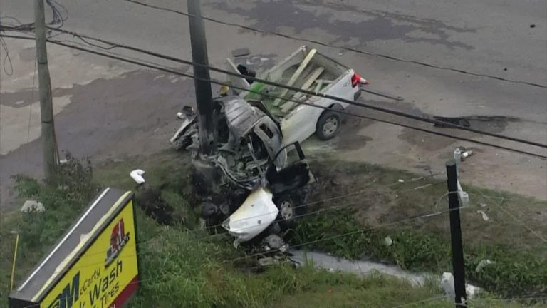 Truck crash into a pole on roadside.