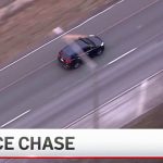 Aerial view of a police car chase.