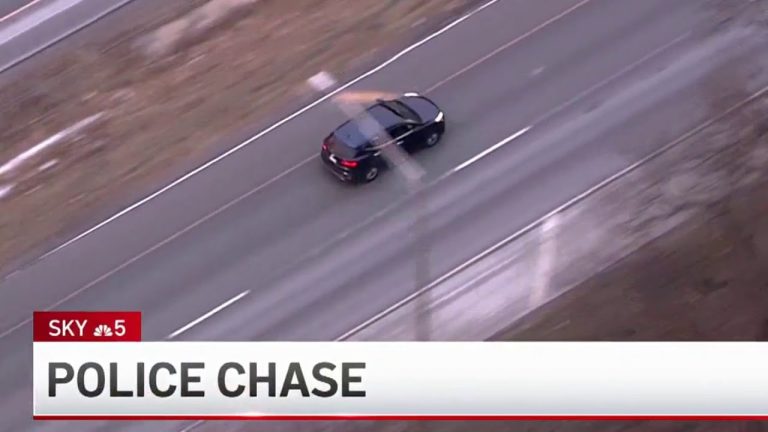 Aerial view of a police car chase.