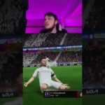 Gamer reacting to virtual soccer goal celebration.