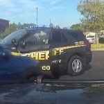 Police car involved in parking lot accident