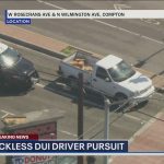 Police pursuit of DUI driver in Compton streets.