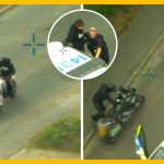 Police chasing suspects on motorcycles from helicopter