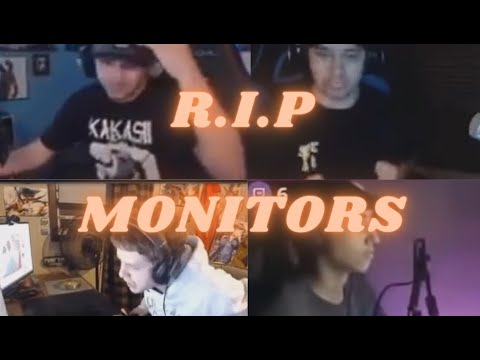 Four gamers playing intensely on monitors.