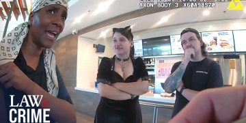 Three people talking at a fast-food counter.