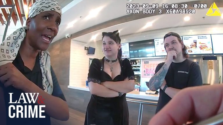 Three people talking at a fast-food counter.