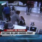 Store security camera captures a fight over line-cutting.