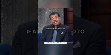 Man speaking on television about aliens visiting Earth.