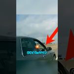 Car sideswiped on highway with arrow and text.