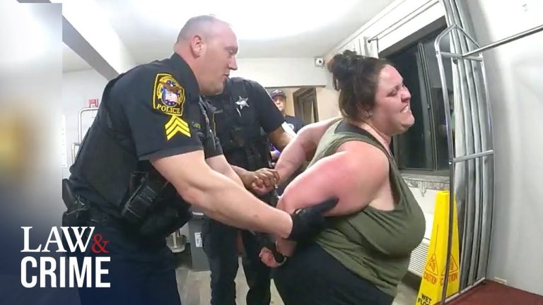 Police officer handcuffing person during arrest