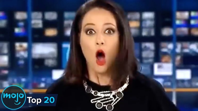 Surprised woman in broadcast studio, mojo logo visible.