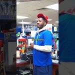 Employee stands frustrated in a convenience store.