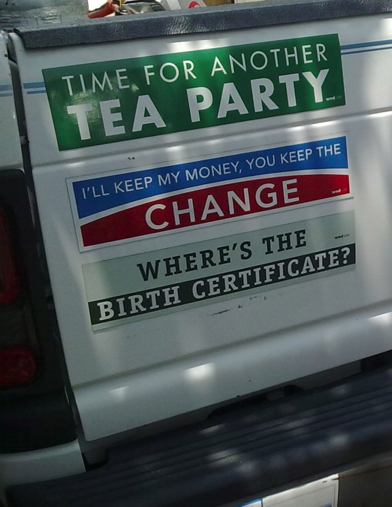 Vehicle bumper stickers with political slogans.