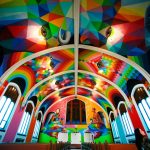 Vibrant colorful church interior with geometric patterns.