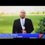 Reporter in park reporting news segment.