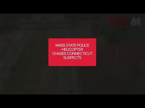 Massachusetts police helicopter pursues Connecticut suspects.