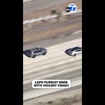 LAPD car chase ends in crash on highway.