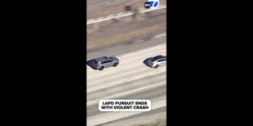 LAPD car chase ends in crash on highway.