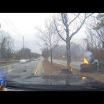 Car crash into tree with engine fire.