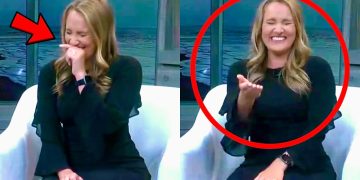 Woman laughing on TV show