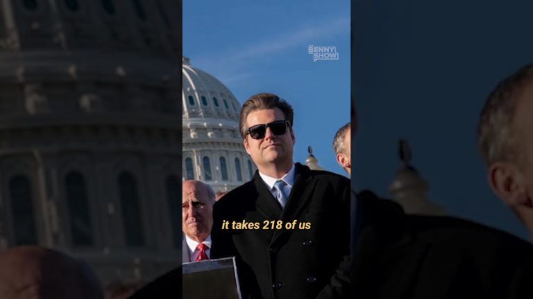 People standing in front of U.S. Capitol building.