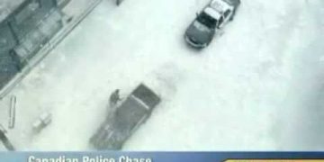 Aerial view of Canadian police chase in snow.