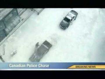 Aerial view of Canadian police chase in snow.