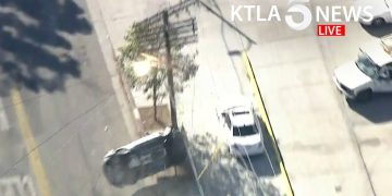 Aerial view of car accident on street.