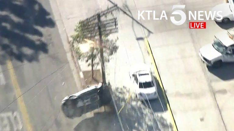 Aerial view of car accident on street.