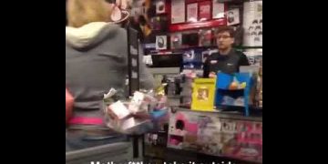 Person holding basket in busy store, confrontation happening.