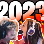 Excited gamers with fiery 2023 background