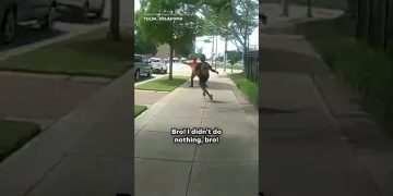 People running on sidewalk in Tulsa, Oklahoma.